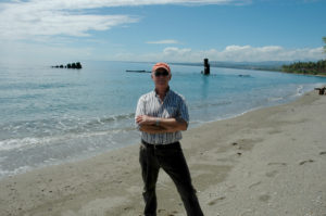 Your author poses next to the remains of the Kinugawa Maru, September 2010