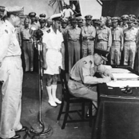 Sir Leonard Isitt signs the surrender document