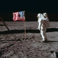 Edwin "Buzz" Aldrin salutes the Stars and Stripes on the surface of the moon in 1969