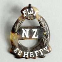 "Be Happy" brooch (Greg Moyle Collection)
