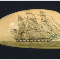 Scrimshaw on whale tooth
